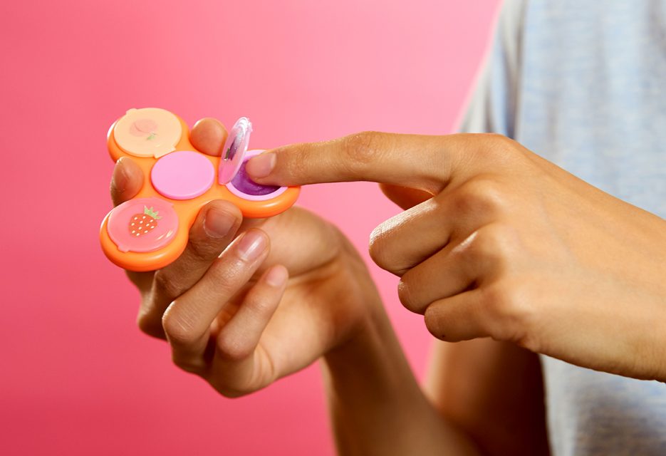 BuzzFeed Just Launched Fidget Spinners with Built-in Lip Gloss and You Definitely Need One