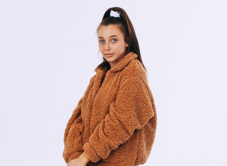 Emma Chamberlain Dishes On Her Back In Stock Fashion Collection